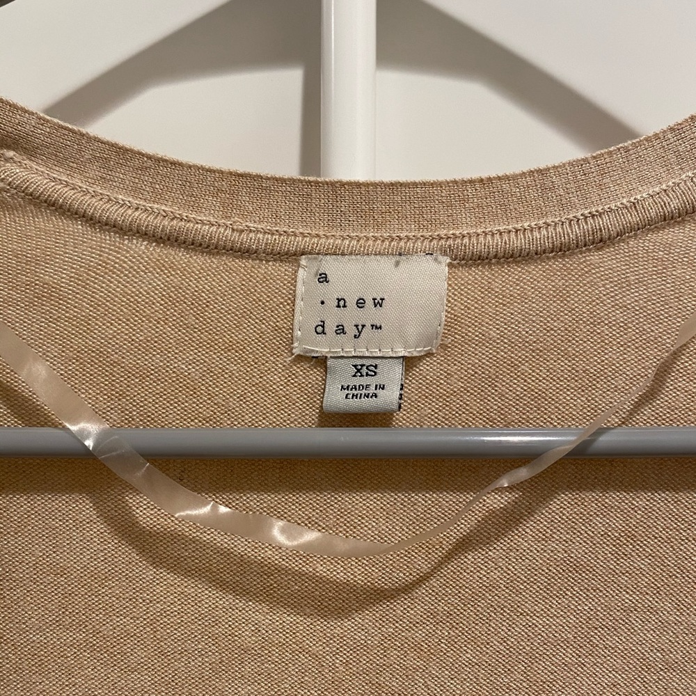 Mid length nude cardigan